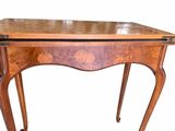 a small wooden table with a drawer on top of it