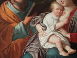 an image of a painting of a man and woman holding a baby