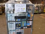 a metal cart with a sign on it in a warehouse