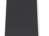 a close up of a black notebook on a white surface