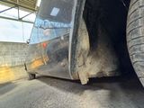 a close up view of a tire on a truck