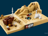 a lego model of a desert with a star wars scene on it