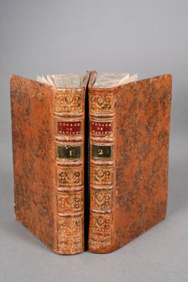 an old book with two pages that have been opened to reveal a picture