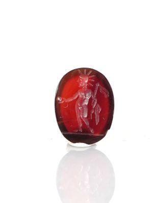 an image of a red glass object with a man on it