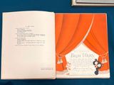 an open book with a picture of a man and a woman on it