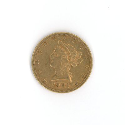 une pièce d'or sur laquelle est représentée la tête d'une femme