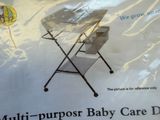 a bag of baby care items sitting on a table