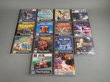 a lot of video games sitting on a table