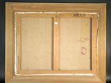 an old picture frame with a picture of a man and a woman on it