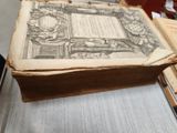 an old book sitting on top of a table
