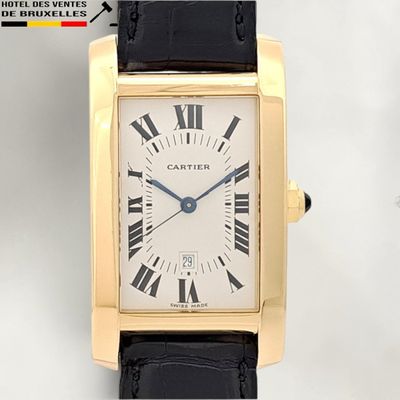 an image of a gold wrist watch with roman numerals on the face