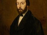 un tableau représentant un homme barbu en costume noir