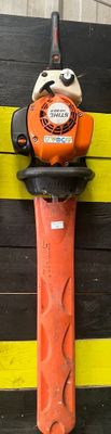 a fire hydrant that is attached to a wall