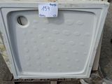 an image of a white dishwasher sitting on a pallet