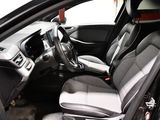 a picture of the inside of a car with the driver ' s seat up