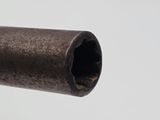 a close up view of a pipe with a hole in it