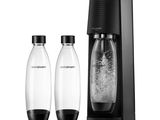 two bottles of soda are next to each other on a white surface