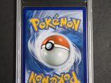 a close up of a card with a pokemon ball on it