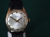 a watch that is sitting on top of a table