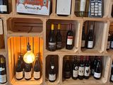 many bottles of wine on the shelves in the room