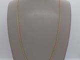 un collier à chaîne en or sur un mannequin mannequin mannequin mannequin mannequin mannequin mannequin mannequin mannequin mannequin