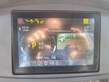 a picture of a car ' s dashboard with a camera attached to it