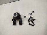 two screws and a couple of nuts on a table