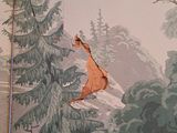 a picture of a giraffe that is jumping in the air
