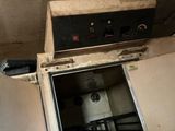 an old oven sitting in the corner of a room