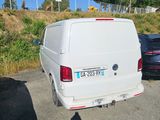a white van parked on the side of the road