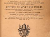 the front cover of an antique book with an image of a helmet on it