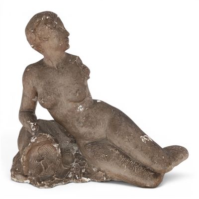an image of a statue of a woman sitting on a rock