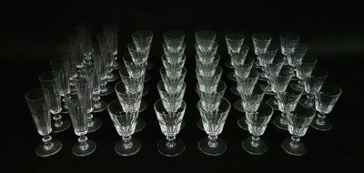 a lot of empty wine glasses sitting on a table