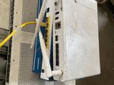 a white box with a yellow wire attached to it