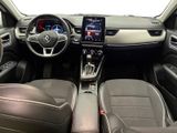 a picture of a car interior with a steering wheel and dashboard