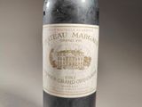 a bottle of wine that is sitting on a table