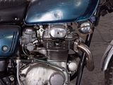 a motorcycle that is parked on the side of the road