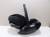 a baby car seat that is attached to the back of the car seat