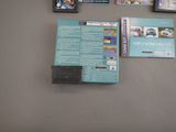many video games on the wall next to each other