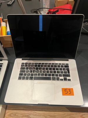 two laptops that are sitting on a table