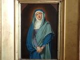 painting of a woman in a blue robe and a blue shawl