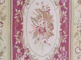 an image of a close up of a rug with flowers on it