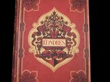 un vieux livre à la couverture rouge posé sur une table