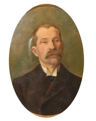 portrait of a man with a moustache in a brown suit