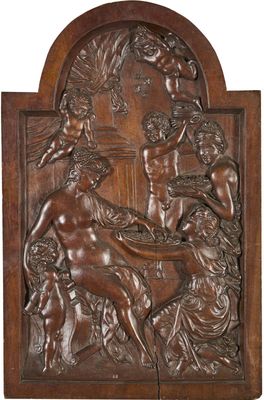 une plaque en bois sculpté représentant une scène de la vie de Jésus