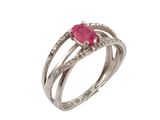 a close up of a ring with a ruby stone on it