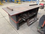 an image of a workbench with a lot of tools on it