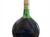 a bottle of wine that is sitting on a table