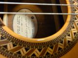 a close up of a guitar with a label on it