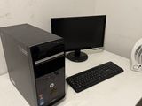 a desktop computer sitting on top of a white desk